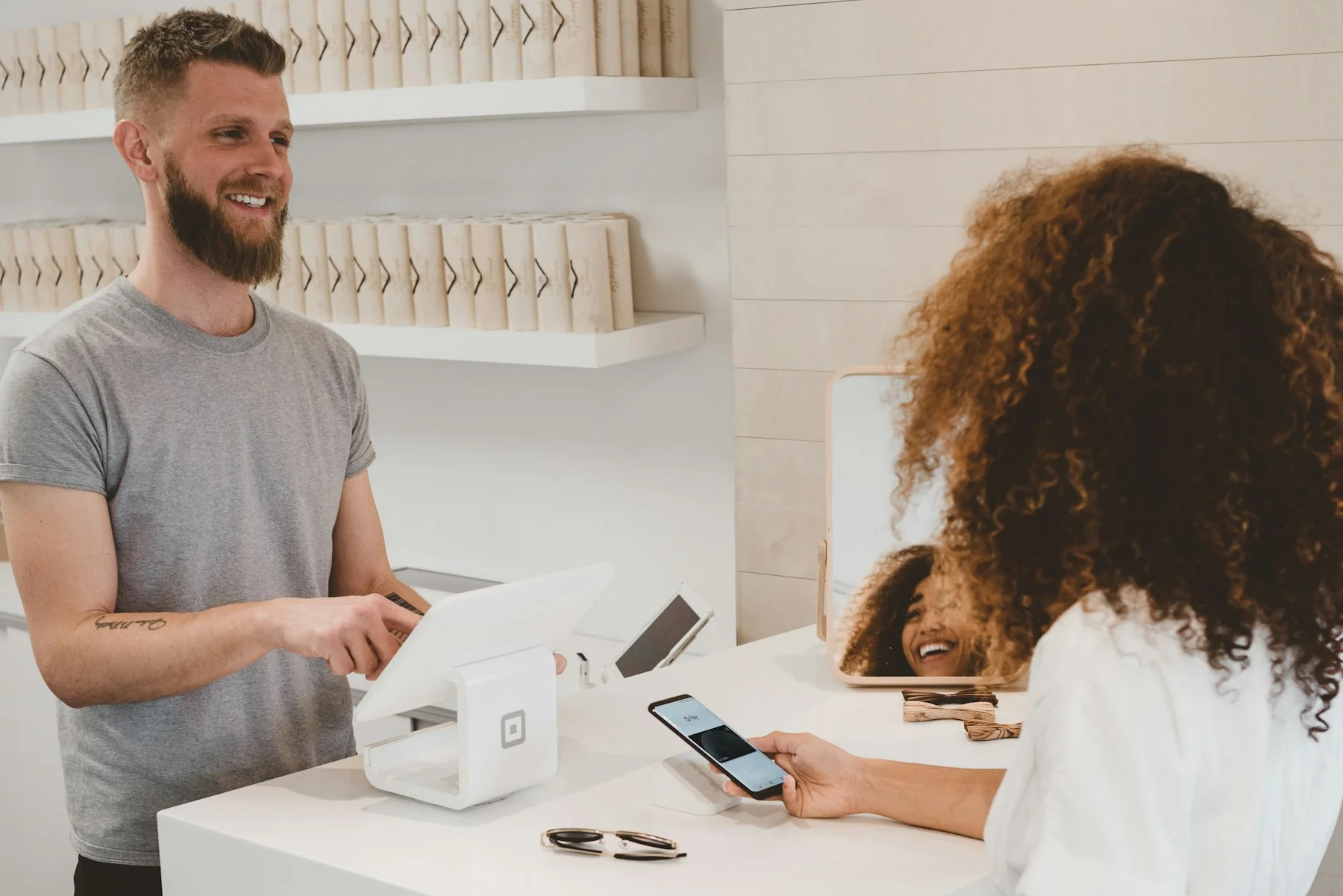 Contactless payment at a retail store checkout counter Contactless payment at a retail store checkout counter