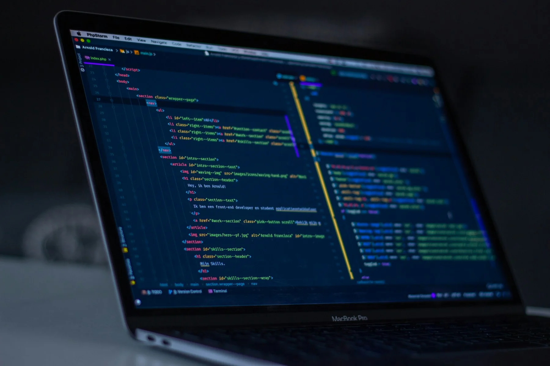 Close-up of code in a dark-mode editor on a laptop Close-up of code in a dark-mode editor on a laptop