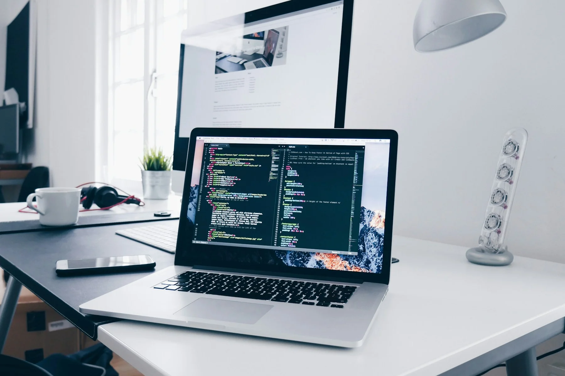 Developer working on a website build on a laptop Developer working on a website build on a laptop